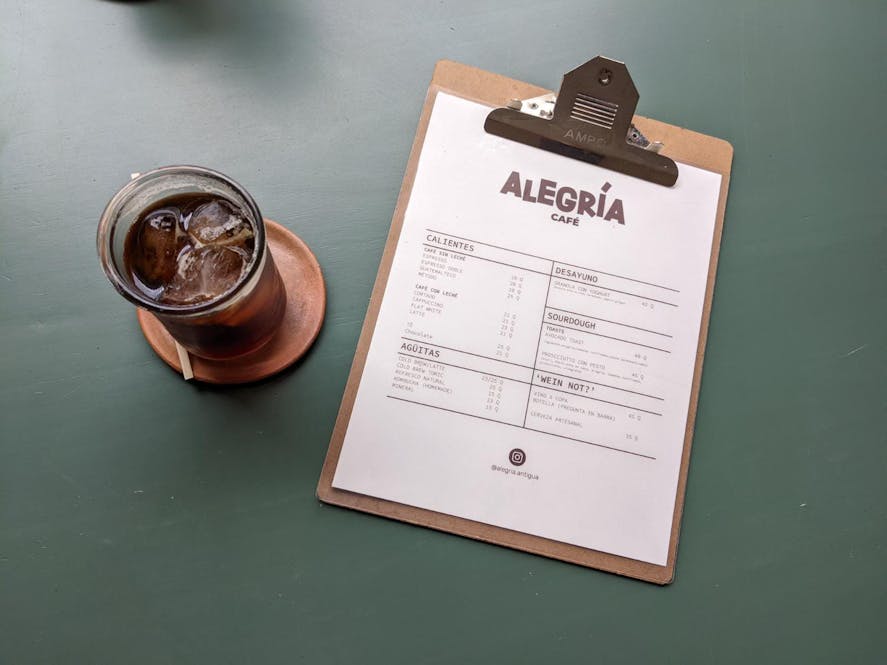 Alegria cafe menu on a clipboard
